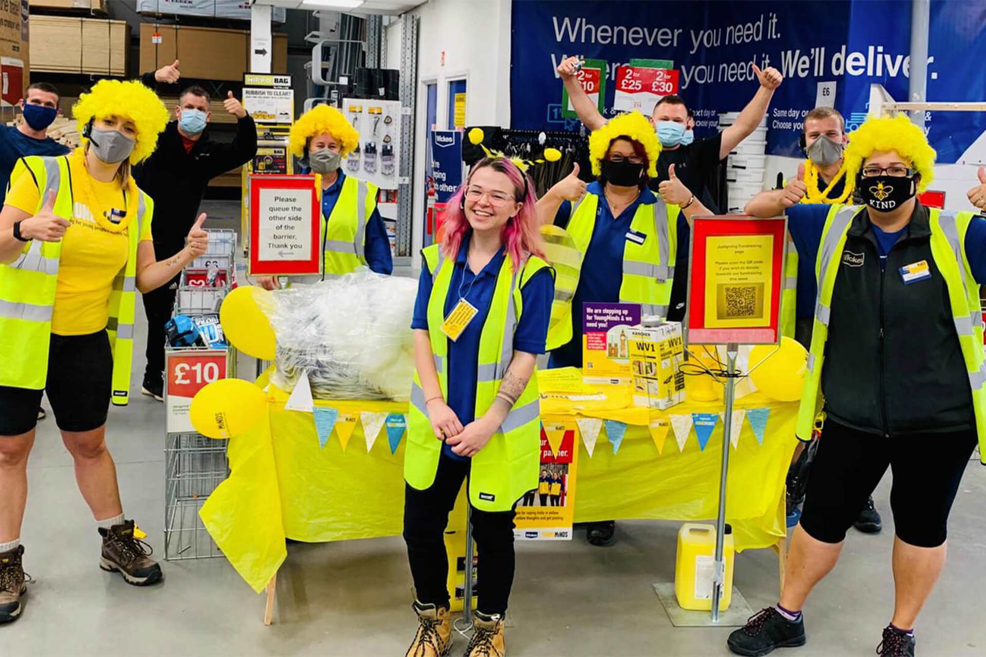 YoungMinds members with corporate partners during a fundraising event