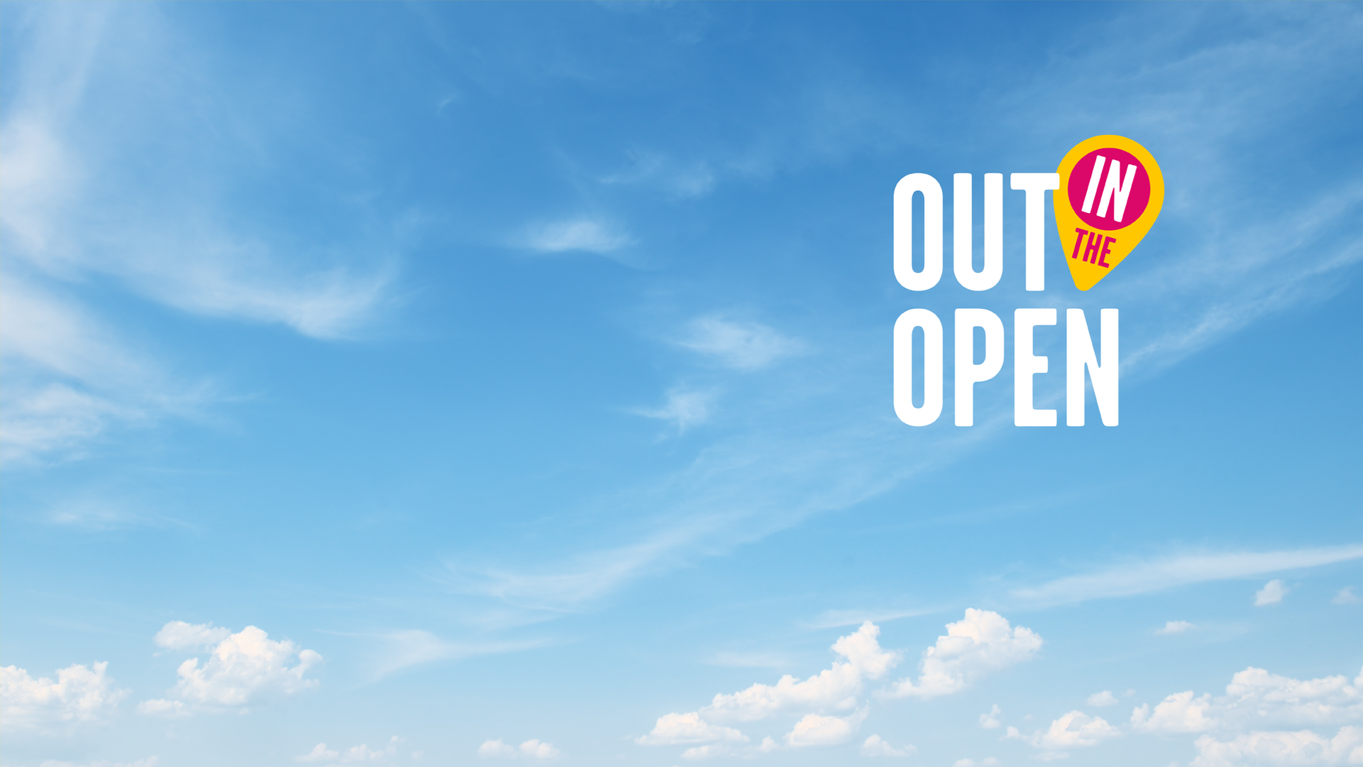 Blue sky with text reading 'Out In The Open'