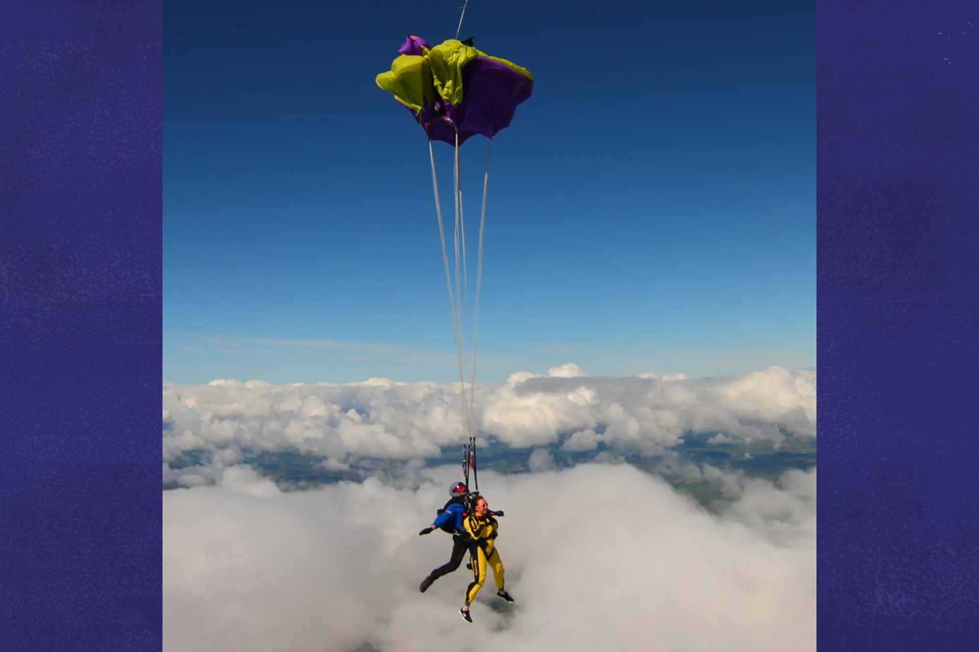 Our fundraiser Laura towards the end of the skydive with a parachute open.