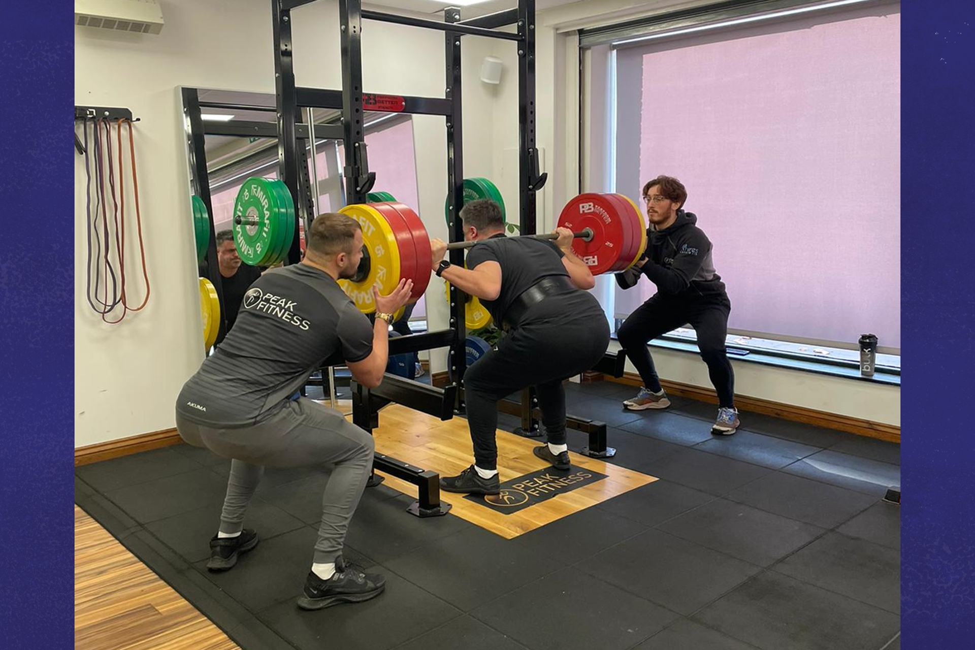 Craig lifting a heavyweight at the gym.