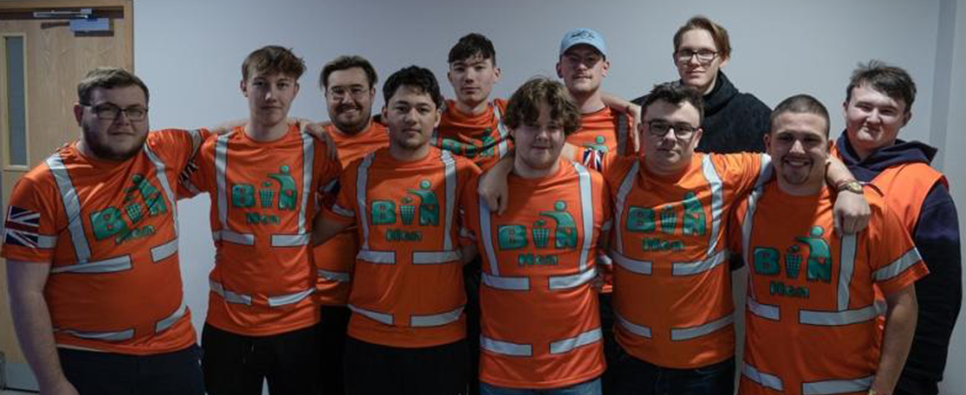 The Binmen group with their arms around each other.