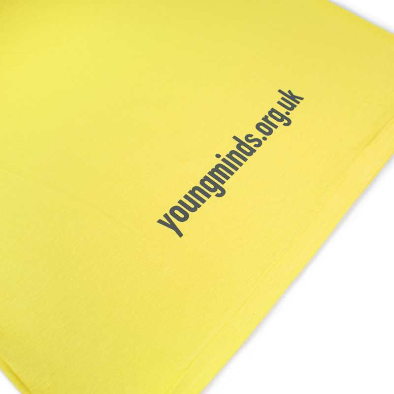 close up of YoungMinds yellow tshirt