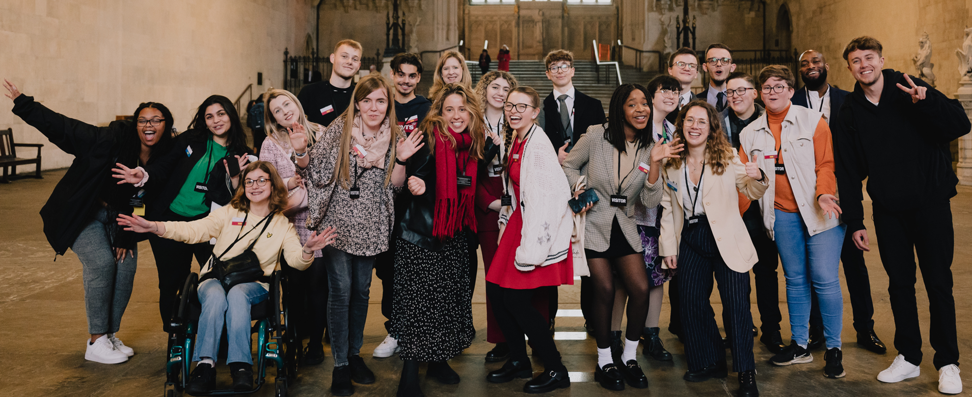 Our Activists standing together in a group in a hall in Parliament.