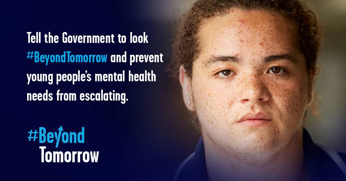 A young person is on the right hand side of the photo looking serious and straight at the camera. On the left there is a dark blue fade which has text over the top. The text reads: Tell the Government to look #BeyondTomorrow and prevent young people's mental health needs from escalating. Underneath the text is the campaign name in light blue and white: #Beyond Tomorrow