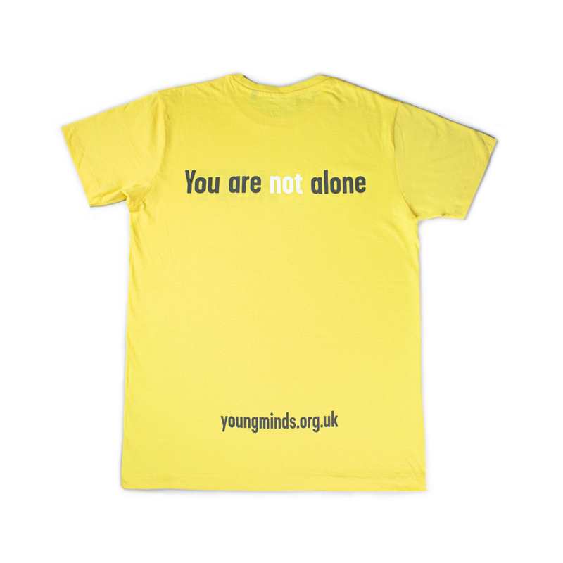 back of YoungMinds yellow tshirt with You are not alone text graphics