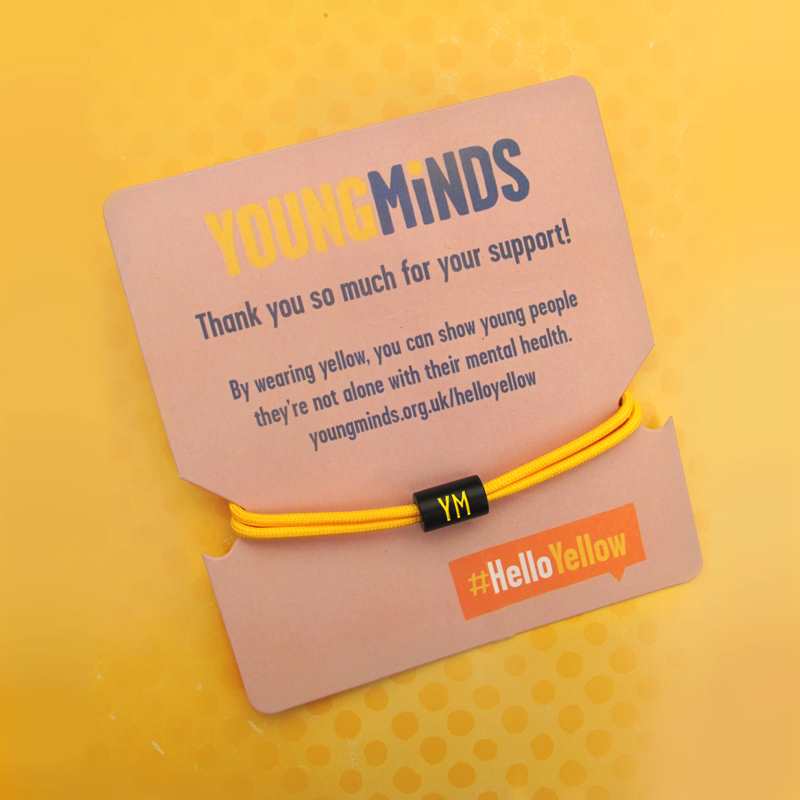 YoungMinds black and yellow bracelet with card